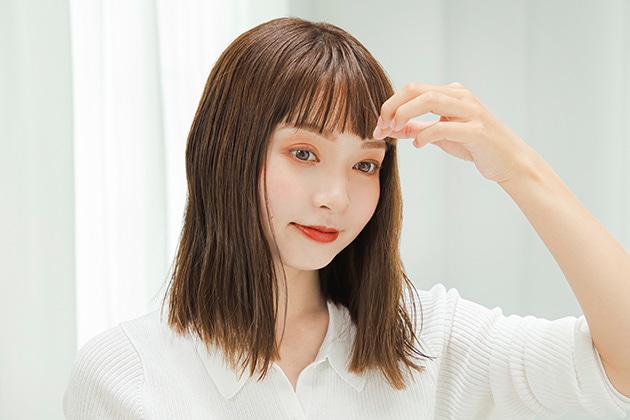 ④手に余ったオイルで髪の表面や前髪を整えて完成！